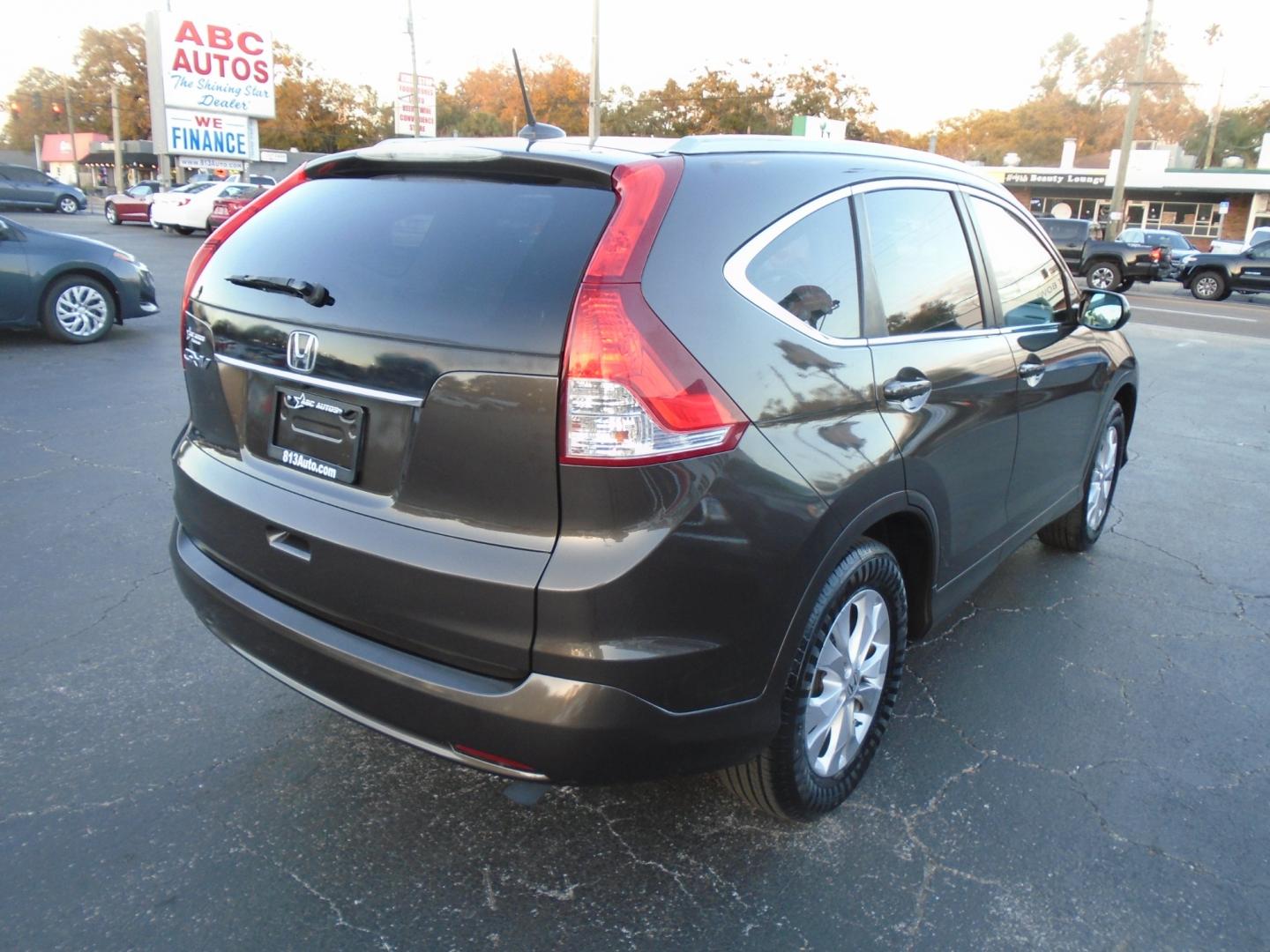 2013 Honda CR-V (5J6RM3H70DL) , located at 6112 N Florida Avenue, Tampa, FL, 33604, (888) 521-5131, 27.954929, -82.459534 - Photo#4